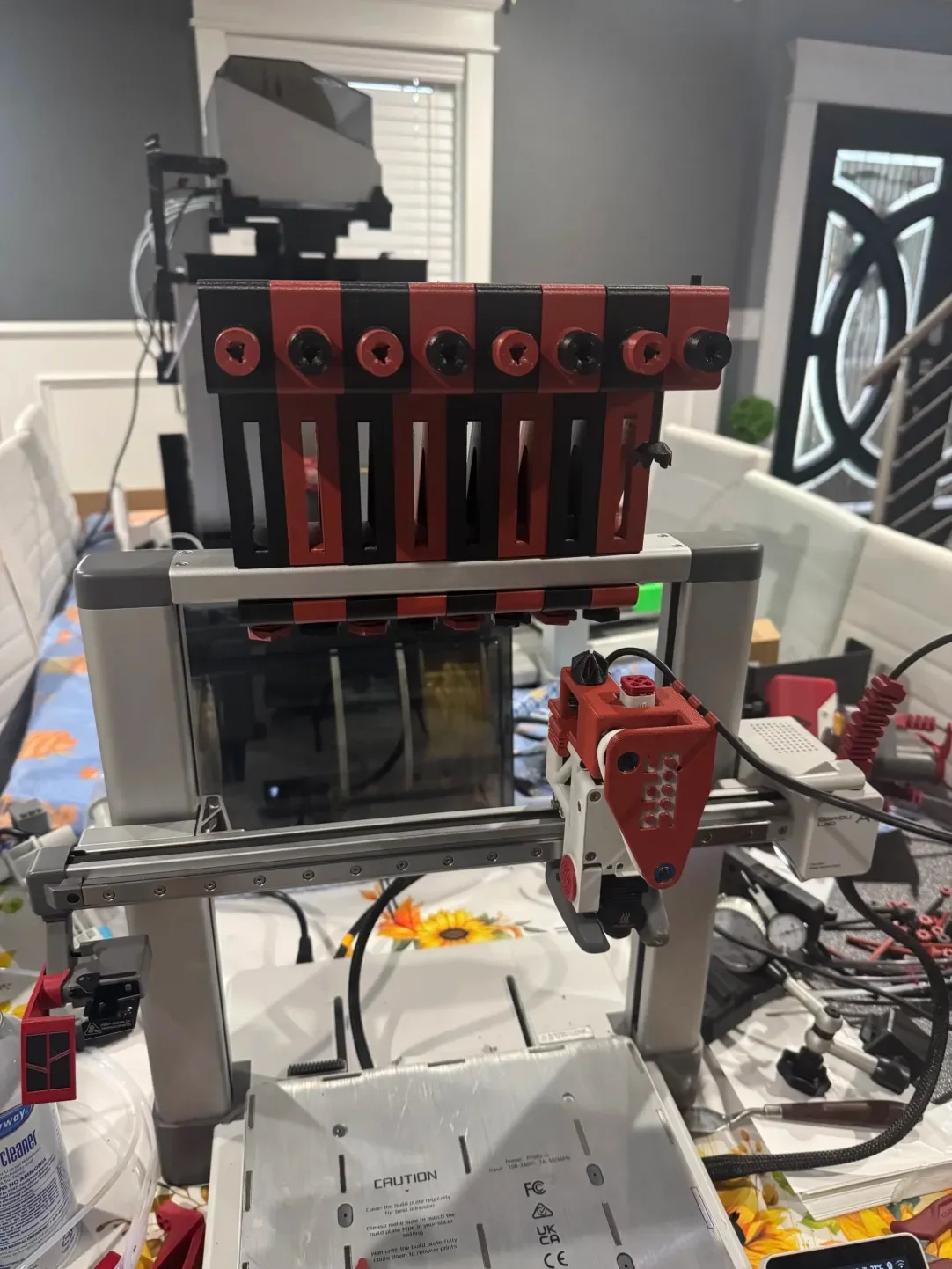 Deadpool inspired red-and-black MechAMS community install mounted on a 3D printer